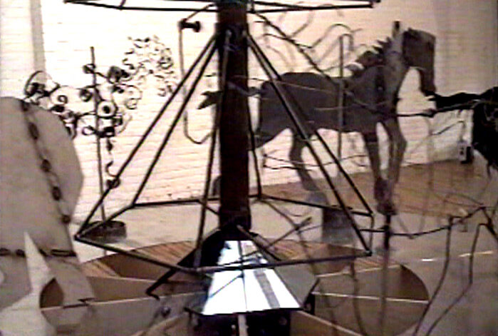 Wire-frame horses and the mirror pyramid of Carousel